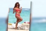 Claudia_Jordan_Looks_Smoking_at_40_in_Bikini-300×194